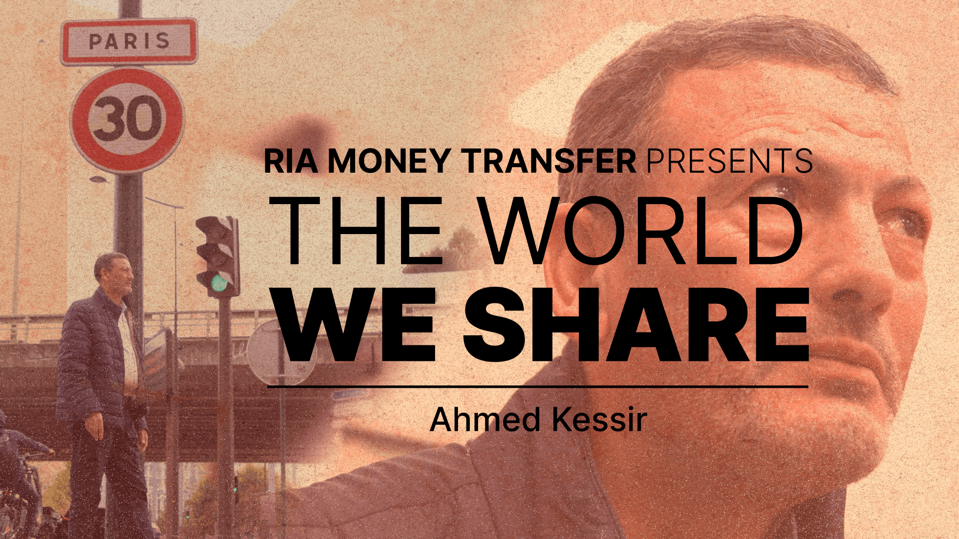 A man stands near a street sign showing the number 30 and the word "Paris." Overlaid text reads: "RIA Money Transfer presents THE WORLD WE SHARE Ahmed Kessir." The man’s face is visible in the foreground.
