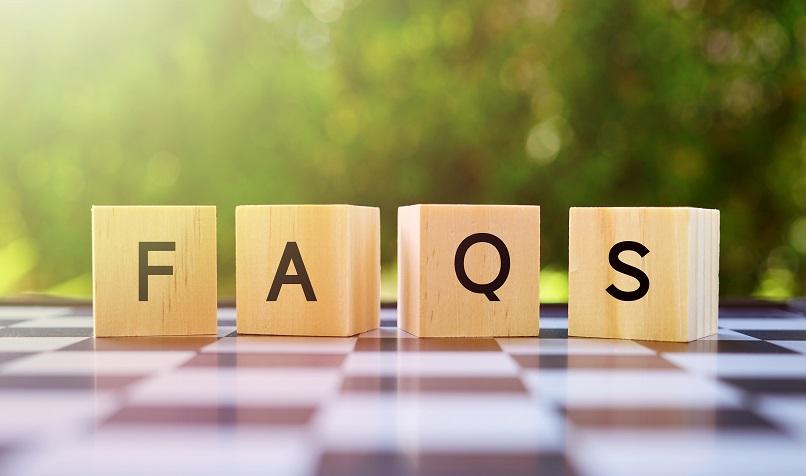 Wooden blocks spelling out FAQS﻿